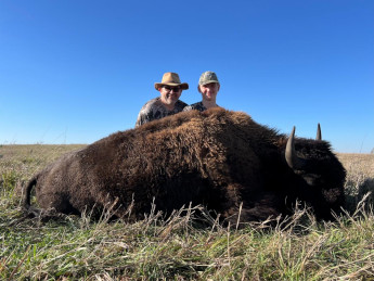 Father and Son Bison Meat Hunting