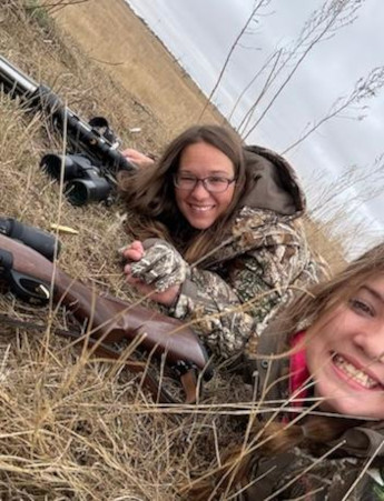 Mother and Daughter Bison Hunting